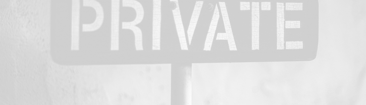 a photograph of a sign with the word private printed on it.